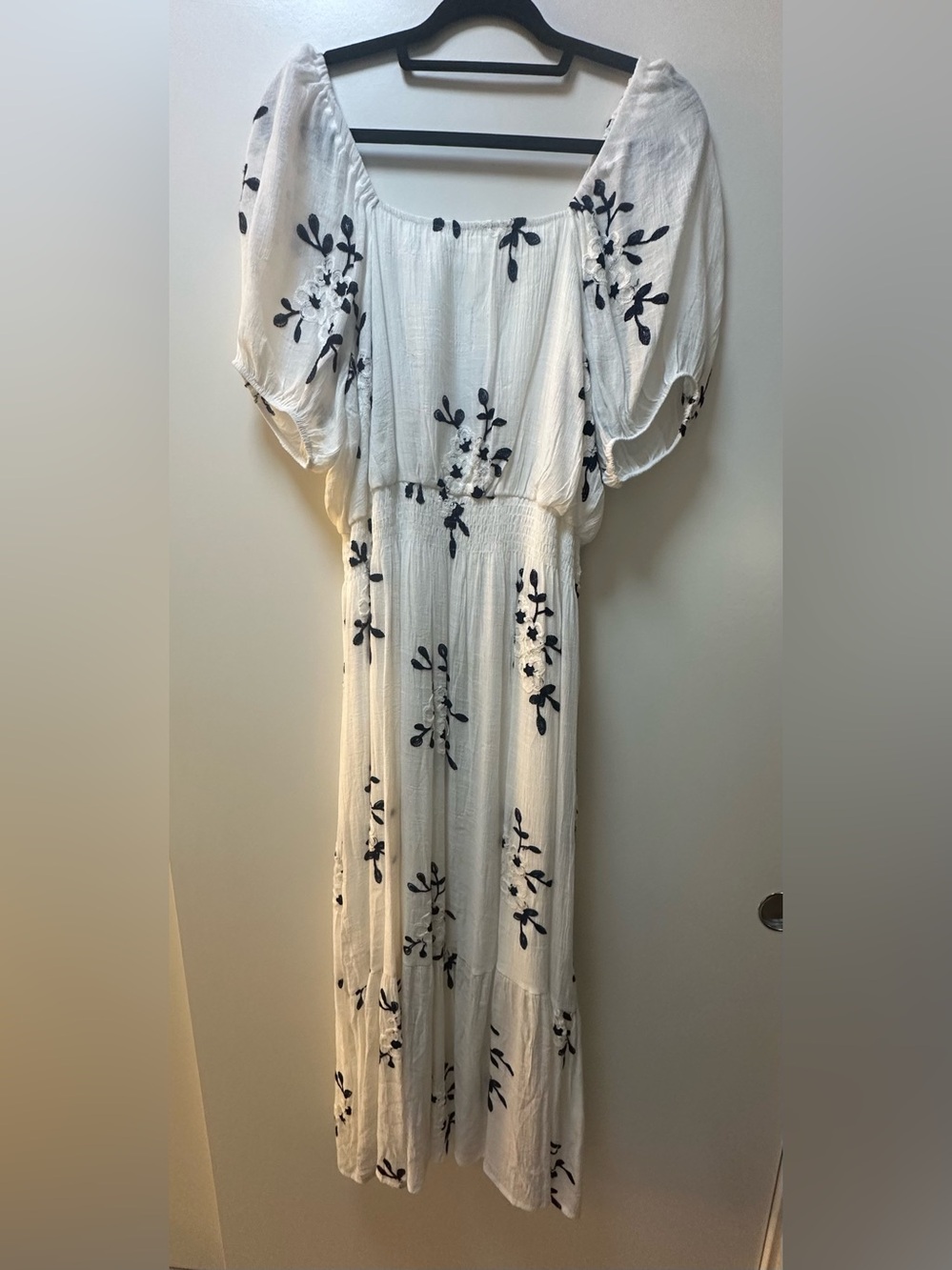 White Maxi Dress with Navy Floral Embroidery. Wear on or off shoulders